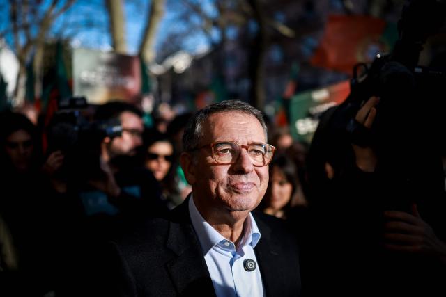 Portuguese Socialist Party (PS) presidential candidate Antonio Jose Seguro looks on during a street rally as part of his campaign for the Portuguese Presidency in Lisbon on January 7, 2026. Portugal goes to the polls to elect a new president on January 18, 2026. (Photo by PATRICIA DE MELO MOREIRA / AFP)