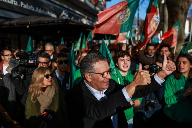 Portuguese Socialist Party (PS) presidential candidate Antonio Jose Seguro gestures during a street rally as part of his campaign for the Portuguese Presidency in Lisbon on January 7, 2026. Portugal goes to the polls to elect a new president on January 18, 2026. (Photo by PATRICIA DE MELO MOREIRA / AFP)