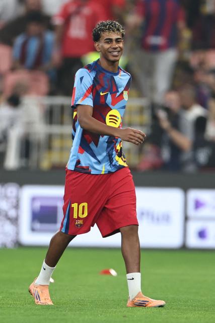 Barcelona's Spanish forward #10 Lamine Yamal during warm up ahead of the Spanish Supercup semi-final football match between FC Barcelona and Athletic Bilbao at King Abdullah Sports City in Jeddah on January 7, 2026. (Photo by Fadel SENNA / AFP)