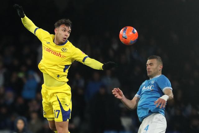 Hellas Verona's Brazilian forward #17 Giovane and Napoli's Italian defender #04 Alessandro Buongiorno jump for the ball during the Italian Serie A football match between Napoli and Hellas Verona at the Diego Armando Maradona stadium in Naples on January 7, 2026. (Photo by Carlo Hermann / AFP)
