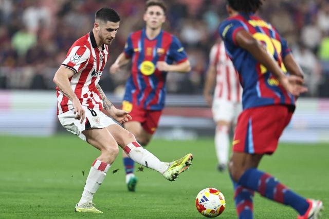 Athletic Bilbao's Spanish midfielder #08 Oihan Sancet kicks the ball during the Spanish Supercup semi-final football match between FC Barcelona and Athletic Bilbao at King Abdullah Sports City in Jeddah on January 7, 2026. (Photo by Fadel SENNA / AFP)