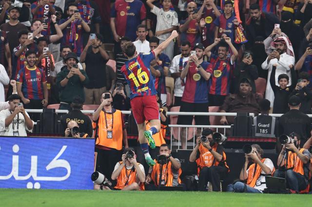 Barcelona's Spanish midfielder #16 Fermin Lopez celebrates after scoring his team's second goal during the Spanish Supercup semi-final football match between FC Barcelona and Athletic Bilbao at King Abdullah Sports City in Jeddah on January 7, 2026. (Photo by Fadel SENNA / AFP)