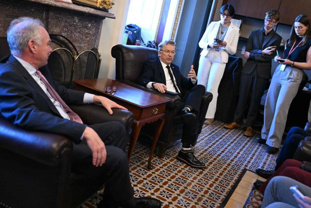 (L/R) US Senator Tim Kaine, Democrat from Virginia, and Senator Rand Paul, Republican from Kentucky, speak to reporters after senators attended a briefing from top Trump administration officials on the recent US military actions in Venezuela, at the US Capitol in Washington, DC on January 7, 2026. (Photo by Brendan SMIALOWSKI / AFP)