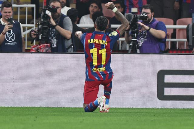 Barcelona's Brazilian forward #11 Raphinha celebrates after scoring his team's fourth goal during the Spanish Supercup semi-final football match between FC Barcelona and Athletic Bilbao at King Abdullah Sports City in Jeddah on January 7, 2026. (Photo by Fadel SENNA / AFP)