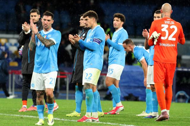 Napoli's Italian defender #22 Giovanni Di Lorenzo and teammates greet supporter at the end of the Italian Serie A football match between Napoli and Hellas Verona at the Diego Armando Maradona stadium in Naples on January 7, 2026. (Photo by Carlo Hermann / AFP)