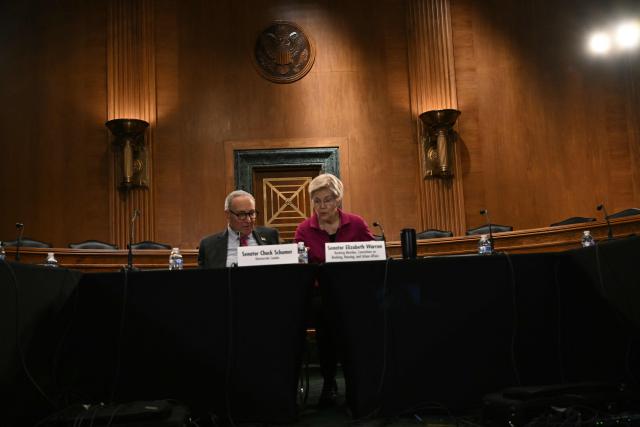 Senate Minority Leader Chuck Schumer, Democrat from New York and Senator Elizabeth Warren, Democrat from Massachusetts conduct a roundtable on housing costs in Washington, DC, January 7, 2026. The roundtable is the first event in Senate Democrats’ push focused on lowering housing costs and addressing the economic pressures facing working families. (Photo by Brendan SMIALOWSKI / AFP)