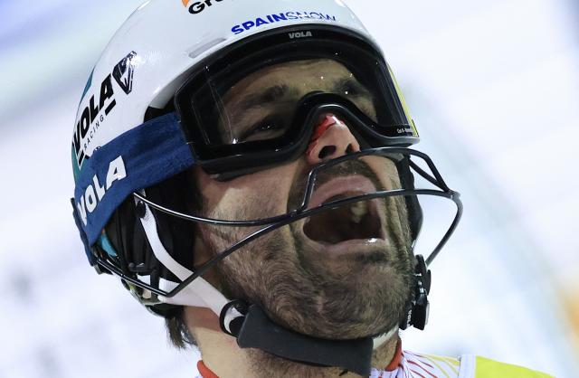 Spain's Joaquim Salarich Baucells reacts in the finish area of the Men's Slalom event, part of the FIS Alpine Ski World Cup 2025-2026, in Madonna di Campiglio, northern Italy, on January 7, 2026. (Photo by Pierre TEYSSOT / AFP)