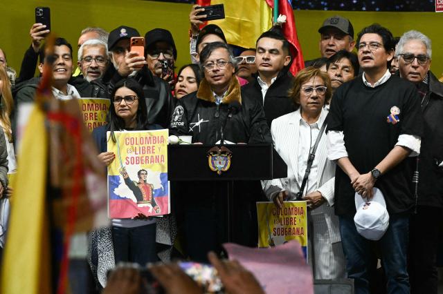 Colombia’s President Gustavo Petro speaks during the March for Sovereignty and Democracy against US President Donald Trump’s threats to Petro at Bolivar Square in Bogota on January 7, 2026. On January 5, Colombian President Gustavo Petro said he was ready to "take up arms" in the face of threats from US counterpart Donald Trump, who over the weekend seized the leader of neighboring Venezuela in a military strike. (Photo by Luis ACOSTA / AFP)