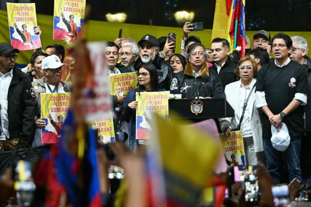 Colombia’s President Gustavo Petro sings the national anthem during the March for Sovereignty and Democracy against US President Donald Trump’s threats to Petro at Bolivar Square in Bogota on January 7, 2026. Donald Trump held his first phone call with Colombian counterpart Gustavo Petro on January 7, the foreign ministry in Bogota said, days after the US President threatened him with military action. (Photo by Luis ACOSTA / AFP)