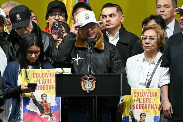Colombia’s President Gustavo Petro sings the national anthem during the March for Sovereignty and Democracy against US President Donald Trump’s threats to Petro at Bolivar Square in Bogota on January 7, 2026. Donald Trump held his first phone call with Colombian counterpart Gustavo Petro on January 7, the foreign ministry in Bogota said, days after the US President threatened him with military action. (Photo by Luis ACOSTA / AFP)