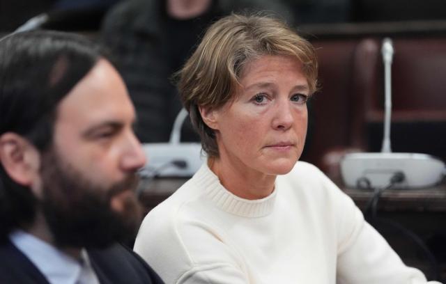 Defendant German entrepreneur and gastronome Christina Block (R) looks on next to her lawyer Ingo Bott as they wait for the continuation of the trial against Christina Block over alleged child abduction at the District Court in Hamburg, northern Germany, on January 8, 2026. The public prosecutor's office accuses Block, heiress of a steakhouse chain, of ordering the abduction of her daughter, born in 2010, and her son, born in 2013. According to the indictment, the background to this is an escalating custody dispute over many years between Block and her former husband, who have four children together. The latter kept the two youngest children with him in August 2021 after an agreed visit to Gravenstein in southern Denmark near the German border, where he had been living for some time. (Photo by Marcus Brandt / POOL / AFP)