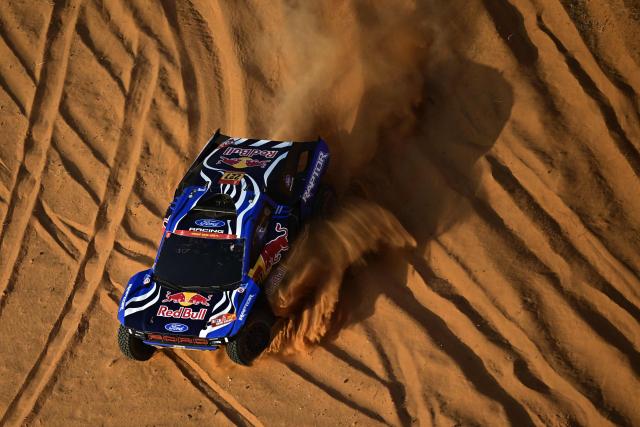 Ford Racing’s Spanish driver Nani Roma and Spanish copilot Alex Haro compete in the Stage 4, a Marathon stage, of the 48th edition of the Dakar Rally 2026, between Al-Ula and Al-Ula, Saudi Arabia, on January 7, 2026. (Photo by Giuseppe CACACE / AFP)