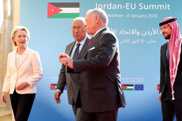 Jordan's King Abdullah II (3rd L) followed by his son Crown Prince Hussein (R) greets European Council President Antonio Costa (2nd L) and European Commission President Ursula von der Leyen (L) as they arrive for the Jordanian-European summit at the Royal Court in the Al-Husseiniya Palace, in Amman on January 8, 2026. The summit is to discuss political and economic cooperation between Jordan and the EU, and the latest regional and international developments. (Photo by Khalil MAZRAAWI / AFP)