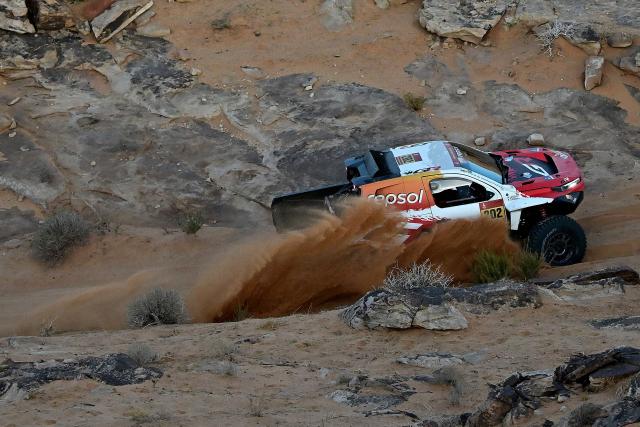 Toyota Gazoo Racing W2rc’s South African driver Henk Lategan and South African co-pilot Brett Cummings compete in the Stage 5 of the 48th edition of the Dakar Rally 2026, between Al-Ula and Hail, Saudi Arabia, on January 8, 2026. (Photo by Giuseppe CACACE / AFP)