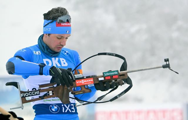 Italy's Tommaso Giacomel competes at the shooting range during the men's 10km sprint competition of the IBU Biathlon World Cup in Oberhof, eastern Germany on January 8, 2026. (Photo by Tobias SCHWARZ / AFP)