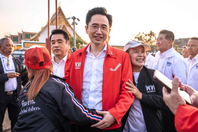 Pheu Thai Party prime ministerial candidate Yodchanan Wongsawat greets supporters during the party’s first major rally at Lan Khon Mueang in Bangkok on January 8, 2025. (Photo by Chanakarn Laosarakham / AFP)