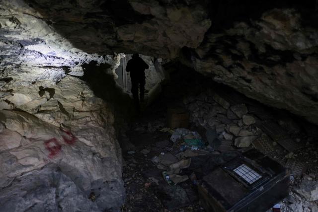 (FILES) This photograph taken during a press tour organised by the Lebanese army shows an abandoned tunnel said to have been used by Hezbollah, in a mountainous valley on the outskirts of the southern village of Zibqin, on November 28, 2025. Lebanon's army said on Januray 8, 2026, that it had completed the first phase of its plan to disarm Hezbollah in south Lebanon, while Israel called the efforts encouraging but "far from sufficient". Under heavy US pressure and amid fears of expanded Israeli strikes, Lebanon has committed to disarming the Iran-backed militant group, which was badly weakened after more than a year of hostilities including two months of all-out war that ended with a November 2024 ceasefire. (Photo by anwar amro / AFP)