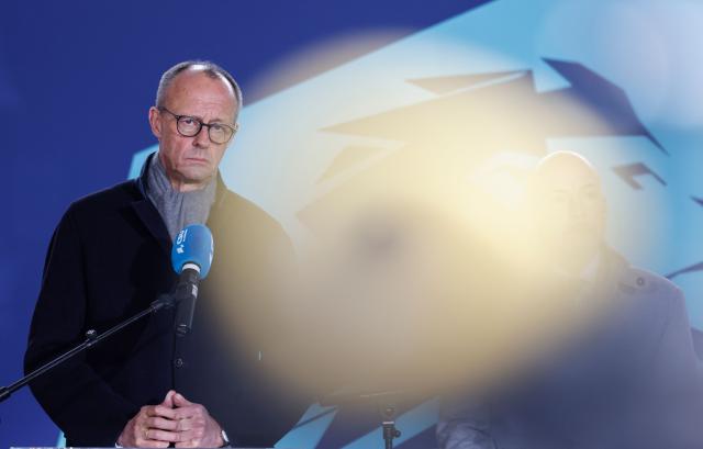 German Chancellor Friedrich Merz delivers a statement after the Bavaria's conservative Christian Social Union (CSU) party's faction retreat at Seeon Abbey in Seeon, southern Germany, on January 8, 2026. (Photo by Michaela STACHE / AFP)