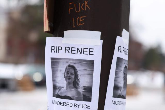 A picture of Renee Nicole Good is displayed near a makeshift memorial for Good, who was shot and killed at point blank range on January 7 by a US Immigration and Customs Enforcement (ICE) agent as she apparently tried to drive away from agents who were crowding around her car, in Minneapolis, Minnesota, on January 8, 2026. A US Immigration and Customs Enforcement (ICE) agent shot and killed an American woman on the streets of Minneapolis January 7, leading to huge protests and outrage from local leaders who rejected White House claims she was a domestic terrorist. (Photo by CHARLY TRIBALLEAU / AFP)