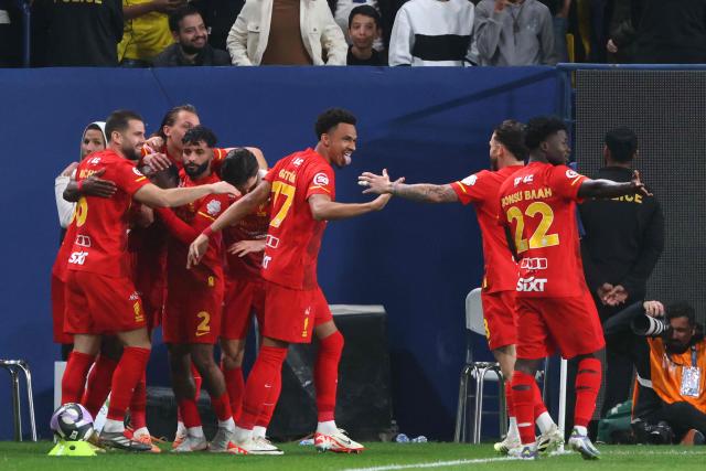 Qadsiah players celebrate their first goal during the Saudi Pro League football match between Al-Nassr FC and Al-Qadsiah at al-Awwal Park stadium in Riyadh on January 8, 2026. (Photo by Fayez NURELDINE / AFP)