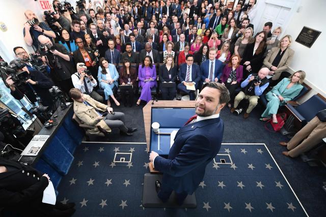 US Vice President JD Vance looks back at cameras behind him during a press briefing in the Brady Briefing Room at the White House in Washington, DC on January 8, 2026. (Photo by Mandel NGAN / AFP)
