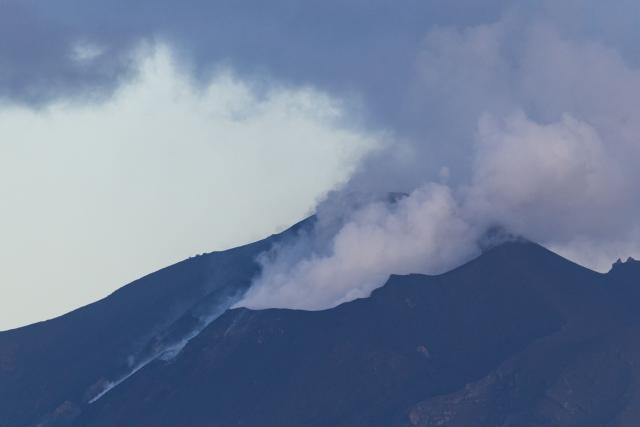 This photograph shows the Stromboli volcano, in the Mediterranean Sea, on January 8, 2026. (Photo by Sameer Al-DOUMY / AFP)