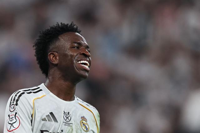 Real Madrid's Brazilian forward #07 Vinicius Junior reacts during the Spanish Supercup semi-final football match between Atletico Madrid and Real Madrid at King Abdullah Sports City in Jeddah on January 8, 2026. (Photo by Fadel SENNA / AFP)