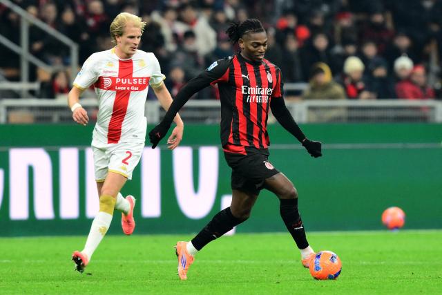 AC Milan's Portuguese forward #10 Rafael Leao fights for the ball with Genoa's Norwegian midfielder #02 Morten Thorsby during the Italian Serie A football match between AC Milan and Genoa at San Siro stadium in Milan, northern Italy, on January 8, 2025. (Photo by Stefano RELLANDINI / AFP)