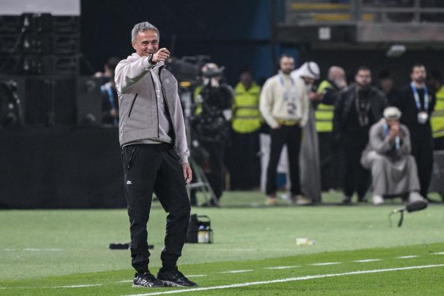 Paris Saint-Germain's Spanish headcoach Luis Enrique reacts after winning the French Champions' Trophy (Trophee des Champions) football match between Paris Saint-Germain (PSG) and Olympique de Marseille (OM) at the Jaber Al-Ahmad International Stadium in Kuwait City on January 8, 2026. (Photo by Yasser AL ZAYYAT / AFP)