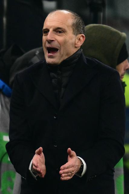 AC Milan's Italian coach Massimiliano Allegri reacts during the Italian Serie A football match between AC Milan and Genoa at San Siro stadium in Milan, northern Italy, on January 8, 2025. (Photo by Stefano RELLANDINI / AFP)