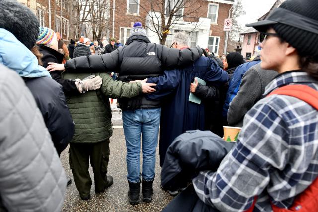 Clergy, faith and community leaders gather to call for ICE to leave the community following the fatal shooting of Renee Good during a law enforcement operation in Minneapolis, Minnesota, on January 8, 2026. A US Immigration and Customs Enforcement (ICE) agent shot and killed an American woman on the streets of Minneapolis January 7, leading to huge protests and outrage from local leaders who rejected White House claims she was a domestic terrorist. The woman, identified in local media as 37-year-old Renee Nicole Good, was hit at point blank range as she apparently tried to drive away from agents who were crowding around her car, which they said was blocking their way. (Photo by Octavio JONES / AFP)