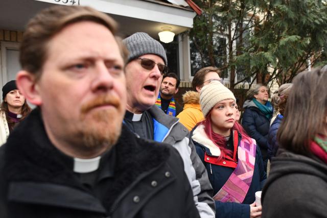 Clergy, faith and community leaders gather to call for ICE to leave the community following the fatal shooting of Renee Good during a law enforcement operation in Minneapolis, Minnesota, on January 8, 2026. A US Immigration and Customs Enforcement (ICE) agent shot and killed an American woman on the streets of Minneapolis January 7, leading to huge protests and outrage from local leaders who rejected White House claims she was a domestic terrorist. The woman, identified in local media as 37-year-old Renee Nicole Good, was hit at point blank range as she apparently tried to drive away from agents who were crowding around her car, which they said was blocking their way. (Photo by Octavio JONES / AFP)