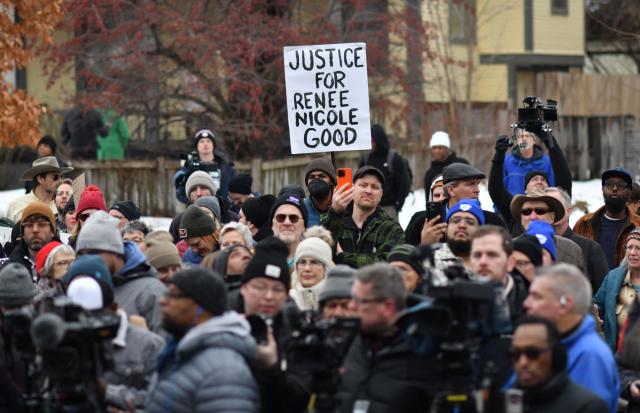 A sign reading "Justice for Renee Nicole Good" is seen as clergy, faith and community leaders gather to call for ICE to leave the community following the fatal shooting of Renee Good during a law enforcement operation in Minneapolis, Minnesota, on January 8, 2026. A US Immigration and Customs Enforcement (ICE) agent shot and killed an American woman on the streets of Minneapolis January 7, leading to huge protests and outrage from local leaders who rejected White House claims she was a domestic terrorist. The woman, identified in local media as 37-year-old Renee Nicole Good, was hit at point blank range as she apparently tried to drive away from agents who were crowding around her car, which they said was blocking their way. (Photo by Octavio JONES / AFP)