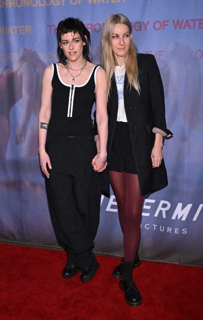 US director, writer, actress Kristen Stewart (L) and her wife producer Dylan Meyer attend the LA premiere of "The Chronology of Water" at 2220 Arts & Archives in Los Angeles on January 8, 2026. (Photo by Lisa O'CONNOR / AFP)