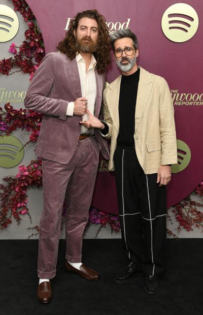 US comedy duo Rhett James McLaughlin (L) and Link Neal (R) of Rhett and Link attend the Hollywood Reporter and Spotify Golden Globe nominees night at The Lot at Formosa in Los Angeles on January 8, 2026. (Photo by Unique Nicole / AFP)