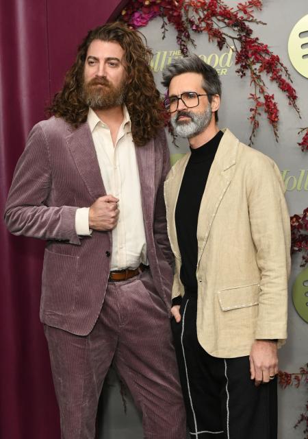 US comedy duo Rhett James McLaughlin (L) and Link Neal (R) of Rhett and Link attend the Hollywood Reporter and Spotify Golden Globe nominees night at The Lot at Formosa in Los Angeles on January 8, 2026. (Photo by Unique Nicole / AFP)