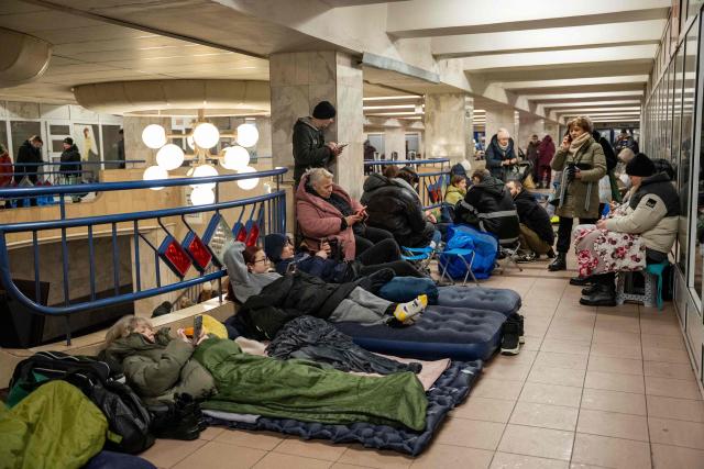 People take shelter at a metro station during Russian drone and missile attacks in Kyiv early on January 9, 2026, amid the Russian invasion of Ukraine. (Photo by Serhii Okunev / AFP)