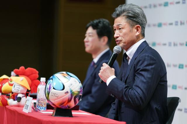 Former Japan forward Kazuyoshi Miura (R) speaks during a press conference to announce his joining of Fukushima United FC in the J-League third division, in Tokyo on January 9, 2026. (Photo by Kazuhiro NOGI / AFP)