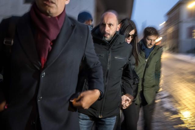 Owners of "Le Constellation" bar Jacques Moretti (L) and Jessica Moretti arrive for a hearing at the Office of the public prosecutor of the Canton of Valais, in Sion, on January 9, 2026. The French couple, facing charges of manslaughter by negligence, bodily harm by negligence and arson by negligence, have been called in for questioning after 40 people, most of them teenagers, were killed, while 116 were injured in a fire that ripped through a bar in the luxury Alpine ski resort of Crans-Montana on New Year's Eve. (Photo by Fabrice COFFRINI / AFP)