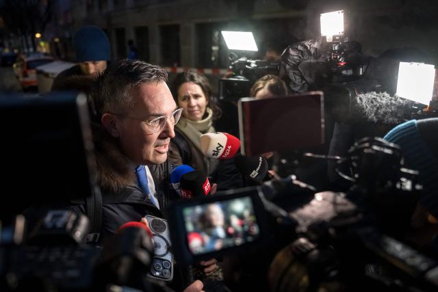 Swiss lawyer Sebastien Fanti, representing four families of injured victims of the fire that ripped through Le Constellation bar during the New Year's Eve celebrations, speaks to the press upon as he arrives at the Office of the public prosecutor of the Canton of Valais in Sion, on January 9, 2026. The French couple, facing charges of manslaughter by negligence, bodily harm by negligence and arson by negligence, have been called in for questioning after 40 people, most of them teenagers, were killed, while 116 were injured in a he fire that ripped through a bar in the luxury Alpine ski resort of Crans-Montana on New Year's Eve. (Photo by Fabrice COFFRINI / AFP)
