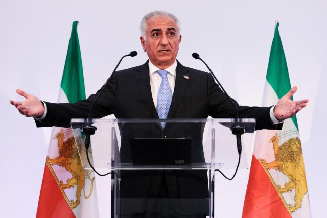 (FILES) Iranian opposition leader and son of the last shah of Iran Mohammad Reza Pahlavi, Reza Pahlavi holds a press conference in Paris on June 23, 2025. The son of the shah of Iran ousted by the 1979 Islamic Revolution, US-based Reza Pahlavi, who had called for major protests on January 8, 2026, meanwhile urged a new show of force in the streets on Januray 9. Iranians staged their biggest protests yet of an almost two week movement sparked by anger over the rising cost of living, chanting slogans including "death to the dictator" and setting fire to official buildings, videos showed. 

. (Photo by JOEL SAGET / AFP)