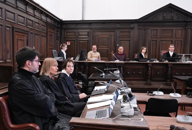 Defendant lawyers Christiane Yueksel (3rdL) and Christiane Berger (2ndL) are pictured ahead of the start of the closed-door “White Tiger” trial at the regional juvenile courtroom in Hamburg, northern Germany, on January 9, 2026. A German juvenile court starts the so-called "White Tiger" trial on January 9, in which a man is accused of multiple sadistic online crimes including coercing a 13-year-old to die by suicide. The defendant, a 21-year-old German-Iranian national living in the northern city of Hamburg, has been only partially identified as Shahriar J., in line with German privacy rules. The case shines a spotlight on the dark world of sadistic online exploitation, where predators seek out vulnerable youths and manipulate them to commit acts of self-harm, violence against themselves or animals, or to kill themselves. (Photo by Marcus Brandt / POOL / AFP)