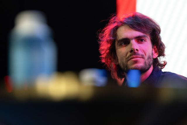 Groupama-FDJ French rider Guillaume Martin-Guyonnet reacts during his cycling team's 2026 presentation in Paris, on January 9, 2026. (Photo by Anne-Christine POUJOULAT / AFP)
