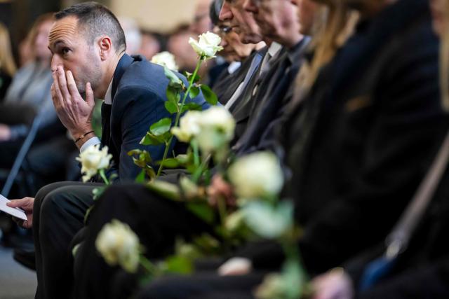 State Councillor and president of the Council of State of the Canton of Valais Mathias Reynard attends a tribute ceremony for the victims of the deadly fire that ripped through the bar Le Constellation in Crans-Montana on New Year's Eve, in Martigny, on January 9, 2026. All of Switzerland will mark a national day of mourning on January 9 for the dozens of mostly teenagers killed when fire ravaged a ski resort bar crammed with New Year revellers. Just over a week after the tragedy at the Le Constellation bar in Crans-Montana, which left 40 dead and 116 injured, the wealthy Alpine nation will come to a standstill for a minute of silence at 2:00 pm (1300 GMT). (Photo by LAURENT GILLIERON / POOL / AFP)