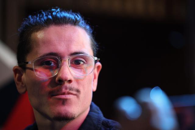 Groupama-FDJ French rider David Gaudu looks on as he attends his team's 2026 presentation in Paris on January 9, 2026. (Photo by Anne-Christine POUJOULAT / AFP)