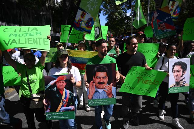 People attend a march in Caracas on January 9, 2026, to demand the release of deposed Venezuelan president Nicolas Maduro and his wife Cilia Flores, snatched and taken to New York on January 3 to face trial on drug and weapons charges. Colombia's President Gustavo Petro on January 9. urged Venezuela to jointly fight drug-traffickers operating across the two countries' border, after the United States threatened further armed action in the region. (Photo by Federico PARRA / AFP)