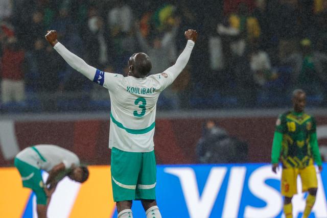 Senegal's defender #03 Kalidou Koulibaly celebrates winning the Africa Cup of Nations (CAN) quarter-final football match between Mali and Senegal at the Grand Stadium in Tangiers on January 9, 2026. (Photo by Abdel Majid BZIOUAT / AFP)