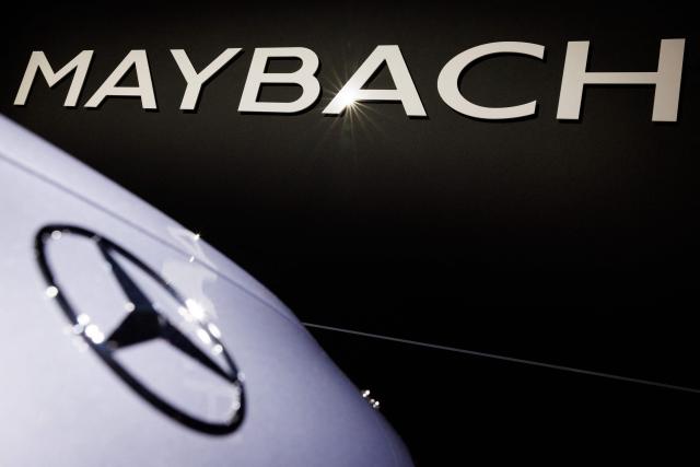 This photograph shows the badge of German automobile manufacturer Mercedes on a vehicle at the Mercedes-Maybach stand during a press opening of the 102th edition of the Brussels Motor Show, at Brussels Expo in Brussels on January 9, 2026. The Mercedes-Maybach (Photo by BENOIT DOPPAGNE / Belga / AFP) / Belgium OUT