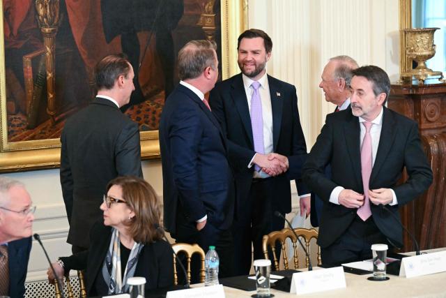 US Vice President JD Vance (C) greets a group of US oil companies executives in the East Room of the White House in Washington, DC on January 9, 2026. President Trump is aiming to convince oil executives to support his plans in Venezuela, a country whose energy resources he says he expects to control for years to come. US forces seized Venezuelan president Nicolas Maduro in a sweeping military operation on January 3, with Trump making no secret that control of Venezuela's oil was at the heart of his actions. (Photo by SAUL LOEB / AFP)