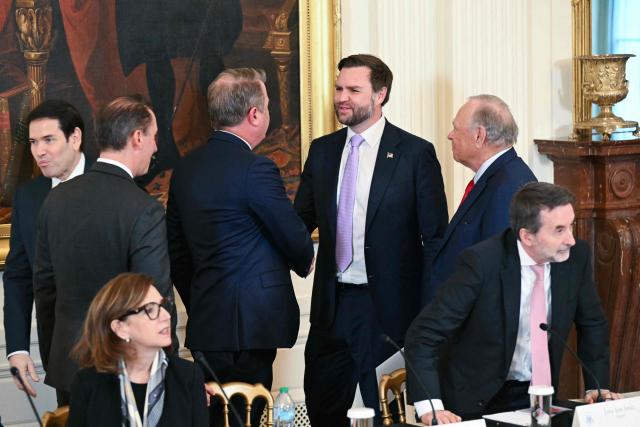 US Vice President JD Vance (C) greets a group of US oil companies executives in the East Room of the White House in Washington, DC on January 9, 2026. President Trump is aiming to convince oil executives to support his plans in Venezuela, a country whose energy resources he says he expects to control for years to come. US forces seized Venezuelan president Nicolas Maduro in a sweeping military operation on January 3, with Trump making no secret that control of Venezuela's oil was at the heart of his actions. (Photo by SAUL LOEB / AFP)